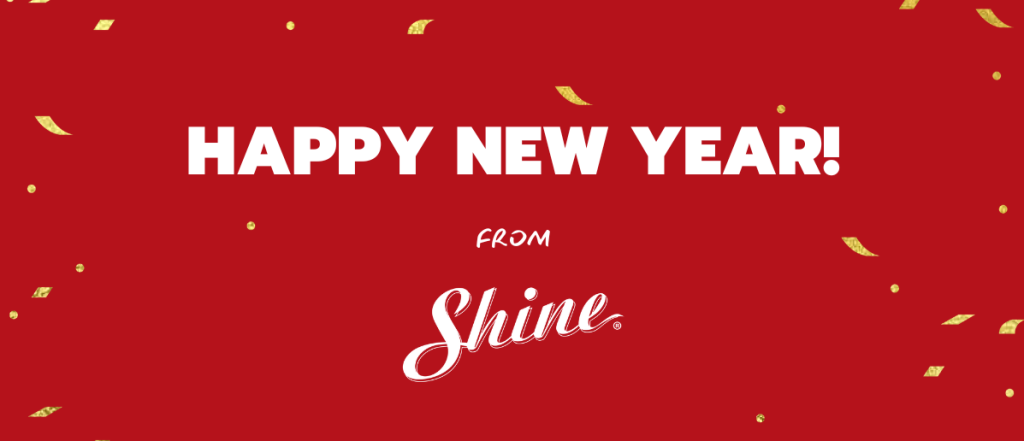 A red background with gold confetti features the white text "HAPPY NEW YEAR! FROM Shine.