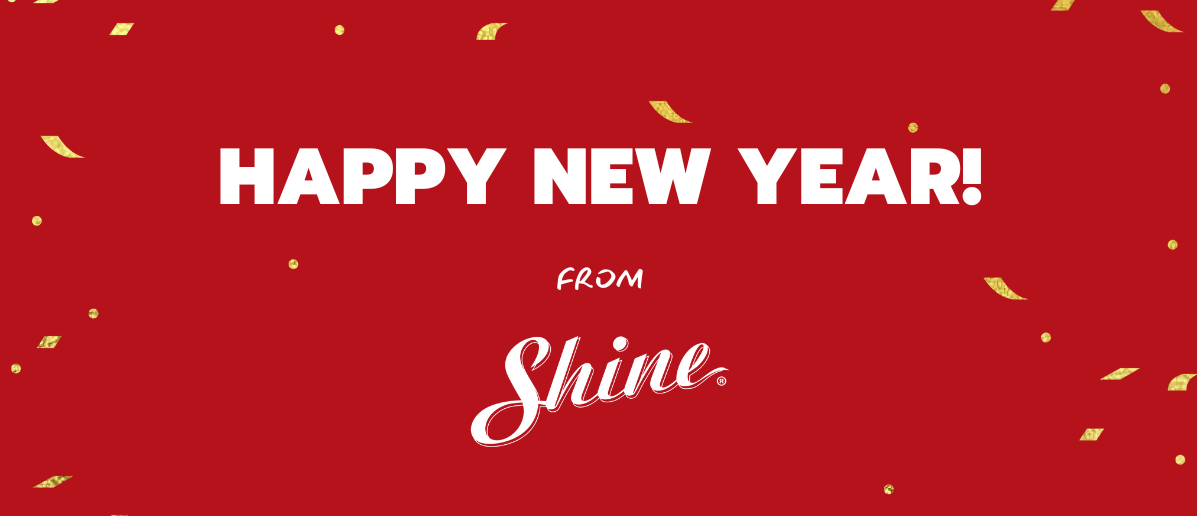 A red background with gold confetti features the white text "HAPPY NEW YEAR! FROM Shine.