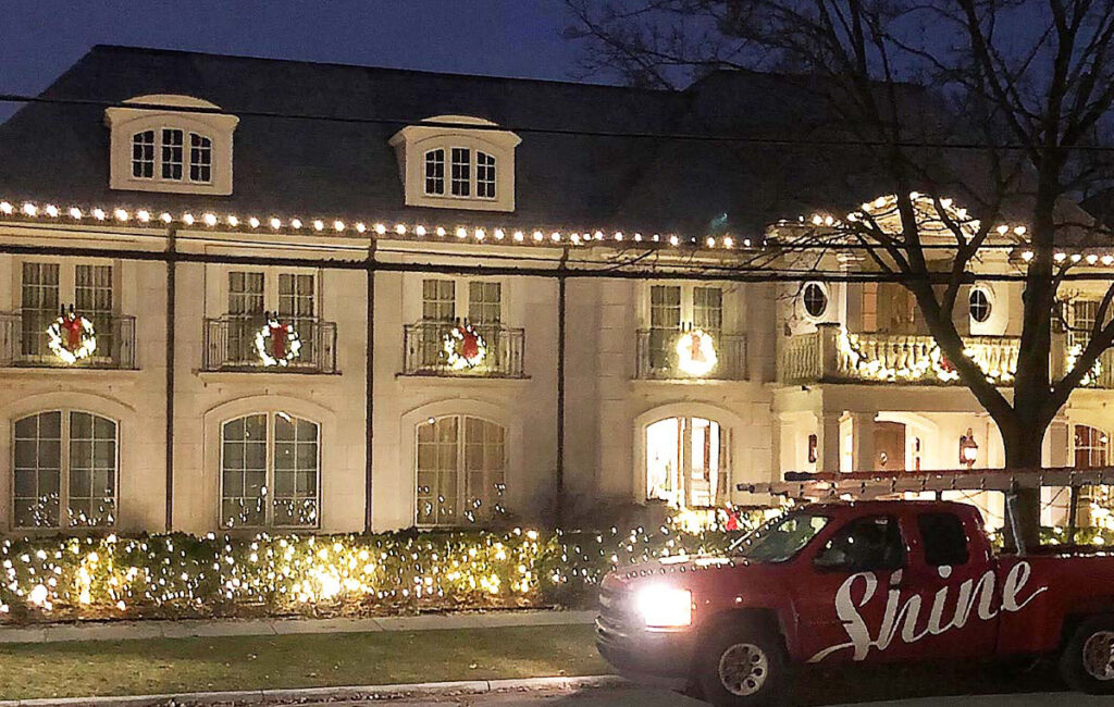 holiday decorated apartments with branded truck