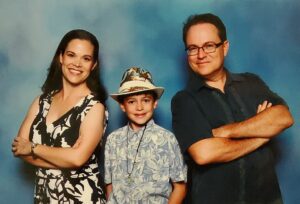Tampa Bay Shine family of Jim Clark and family in front of a studio background.