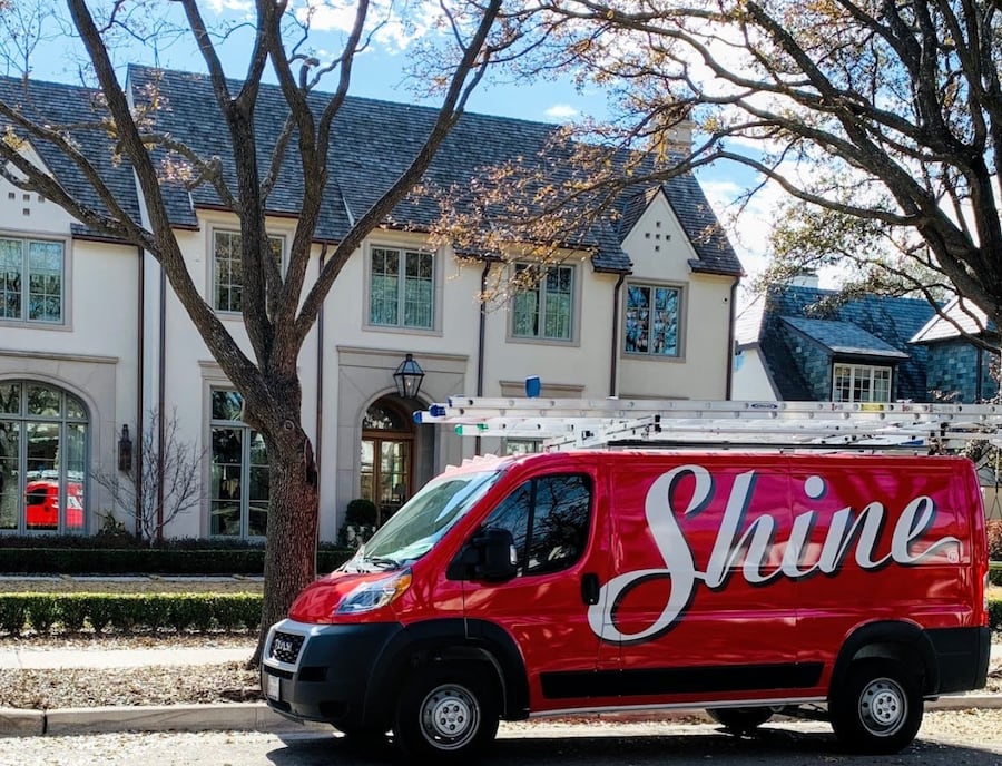 Shine truck pulling up to a clients house for service.