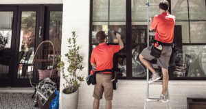 4 Shine guys cleaning windows in Lansing