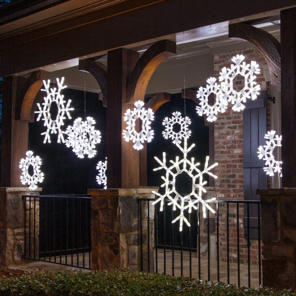 snowflake light displayhttps://www.yardenvy.com/blog/outdoor-christmas-decorating-ideas