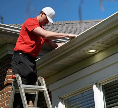 Shine Worker Cleaning Gutters