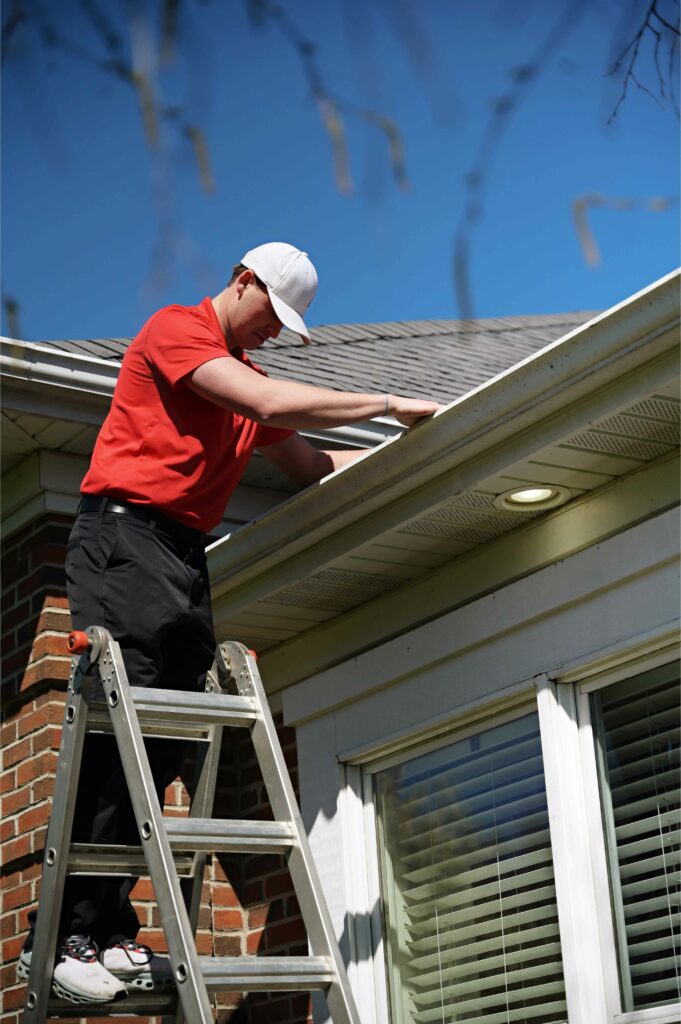 Shine Worker Cleaning Gutters