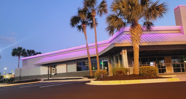 commercial building in Florida with permanent lighting along roof