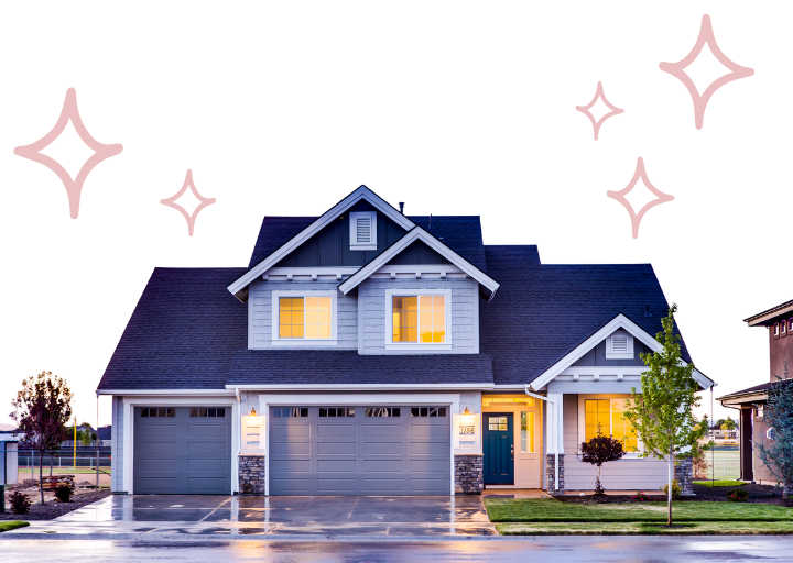 A pristine modern house with glowing windows and a wet driveway, highlighted by sparkles.