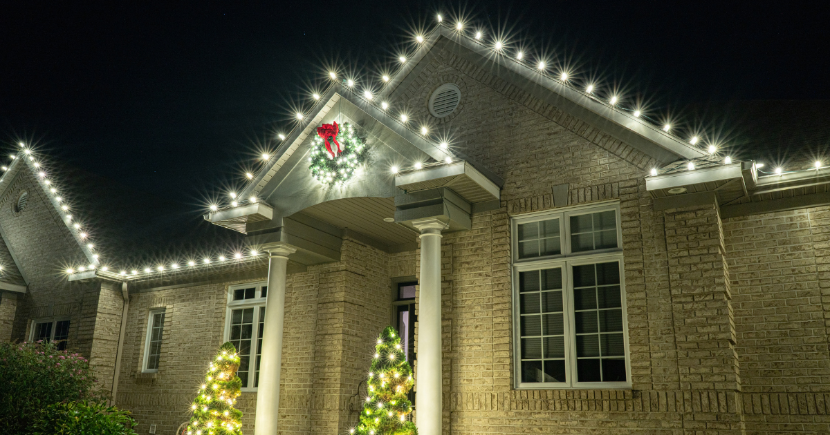 Custom residential holiday lights hung by Shine.