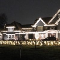 House with festive holiday lighting