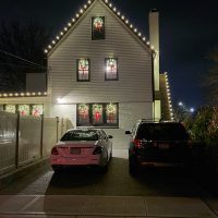 House with holiday lighting installed by shine of long island