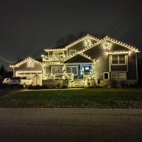 House with holiday lighting installed by shine of long island