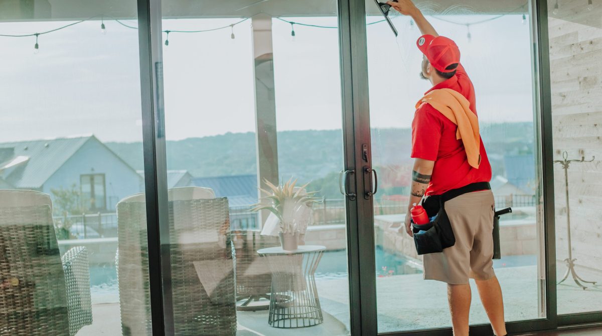 shine-employee-cleaning-windows